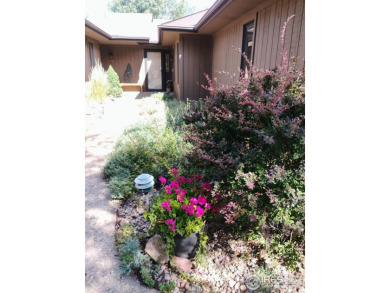 Welcome home to this meticulously maintained townhome, offering on Estes Park Golf Course in Colorado - for sale on GolfHomes.com, golf home, golf lot