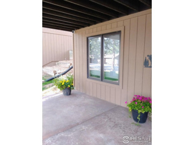 Welcome home to this meticulously maintained townhome, offering on Estes Park Golf Course in Colorado - for sale on GolfHomes.com, golf home, golf lot