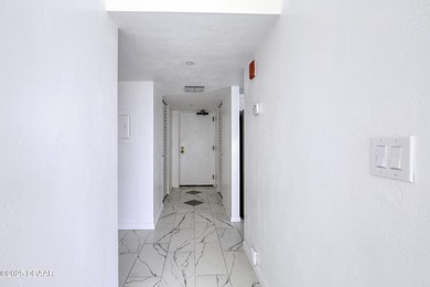 Embrace the best Florida lifestyle in this beautifully updated on Oceans Golf Club in Florida - for sale on GolfHomes.com, golf home, golf lot