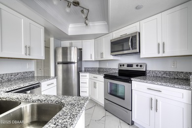 Embrace the best Florida lifestyle in this beautifully updated on Oceans Golf Club in Florida - for sale on GolfHomes.com, golf home, golf lot