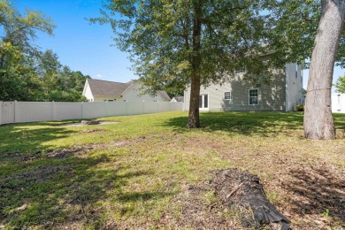 Welcome to this move-in ready, 4 bedroom, 3 bathroom home tucked on Shaftesbury Glen Golf and Fish Club in South Carolina - for sale on GolfHomes.com, golf home, golf lot