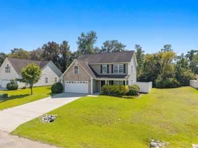 Welcome to this move-in ready, 4 bedroom, 3 bathroom home tucked on Shaftesbury Glen Golf and Fish Club in South Carolina - for sale on GolfHomes.com, golf home, golf lot