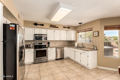 Located on a corner lot just a short walk from the lake in on Estrella Mountain Ranch Golf Course in Arizona - for sale on GolfHomes.com, golf home, golf lot