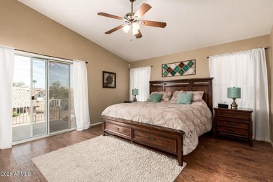 Located on a corner lot just a short walk from the lake in on Estrella Mountain Ranch Golf Course in Arizona - for sale on GolfHomes.com, golf home, golf lot