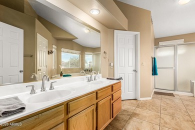 Located on a corner lot just a short walk from the lake in on Estrella Mountain Ranch Golf Course in Arizona - for sale on GolfHomes.com, golf home, golf lot