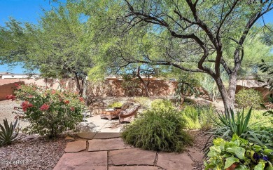 Nestled on a premium large lot adorned with lush landscaping on Anthem Golf and Country Club  in Arizona - for sale on GolfHomes.com, golf home, golf lot