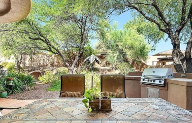 Nestled on a premium large lot adorned with lush landscaping on Anthem Golf and Country Club  in Arizona - for sale on GolfHomes.com, golf home, golf lot