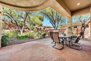 Nestled on a premium large lot adorned with lush landscaping on Anthem Golf and Country Club  in Arizona - for sale on GolfHomes.com, golf home, golf lot