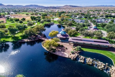 Nestled on a premium large lot adorned with lush landscaping on Anthem Golf and Country Club  in Arizona - for sale on GolfHomes.com, golf home, golf lot