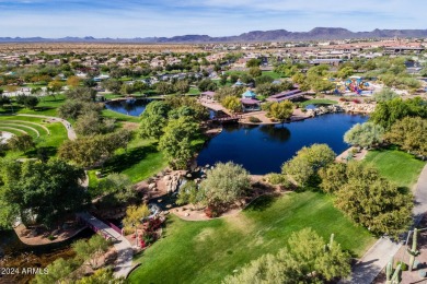 Nestled on a premium large lot adorned with lush landscaping on Anthem Golf and Country Club  in Arizona - for sale on GolfHomes.com, golf home, golf lot