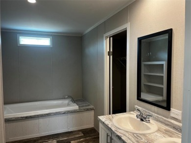 Wake up in a Beautiful 2025 4 Bed 2 Bath 1,570 Square Foot home on The Club At Runaway Bay in Texas - for sale on GolfHomes.com, golf home, golf lot