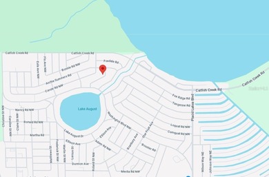 Buildable residential lot in the well-established Placid Lakes on Placid Lakes Country Club in Florida - for sale on GolfHomes.com, golf home, golf lot