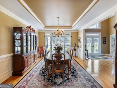 Nestled in the prestigious Windermere community, this on Windermere Golf Club in Georgia - for sale on GolfHomes.com, golf home, golf lot