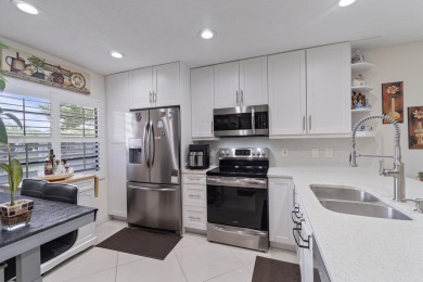 Beautifully Remodeled 2-Bedroom Lakefront Apartment in The Pines on Boca Lago Golf and Country Club in Florida - for sale on GolfHomes.com, golf home, golf lot