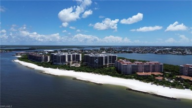 Beautiful three-bedroom beachfront condominium in the Riviera at on Hideaway Beach Golf Course in Florida - for sale on GolfHomes.com, golf home, golf lot