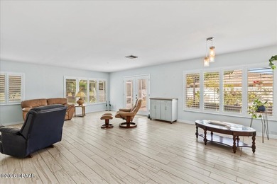 COASTAL LIVING with CHARACTER... Where MORNINGS START ON THE on Palm Harbor Golf Club in Florida - for sale on GolfHomes.com, golf home, golf lot