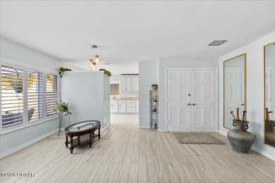 COASTAL LIVING with CHARACTER... Where MORNINGS START ON THE on Palm Harbor Golf Club in Florida - for sale on GolfHomes.com, golf home, golf lot