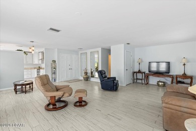 COASTAL LIVING with CHARACTER... Where MORNINGS START ON THE on Palm Harbor Golf Club in Florida - for sale on GolfHomes.com, golf home, golf lot