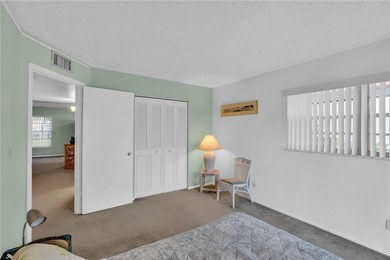 Nicely maintained 1st floor *A* plan, 2/2 condo. Being offered on The American Golf Club in Florida - for sale on GolfHomes.com, golf home, golf lot