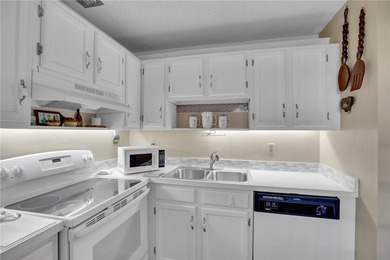 Nicely maintained 1st floor *A* plan, 2/2 condo. Being offered on The American Golf Club in Florida - for sale on GolfHomes.com, golf home, golf lot