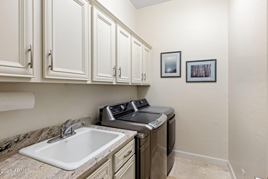 Discover this beautifully remodeled patio home nestled in the on Troon Country Club in Arizona - for sale on GolfHomes.com, golf home, golf lot