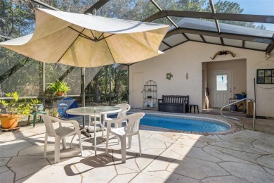 One or more photo(s) has been virtually staged. Charming Home in on Sugarmill Woods Golf and Country Club in Florida - for sale on GolfHomes.com, golf home, golf lot