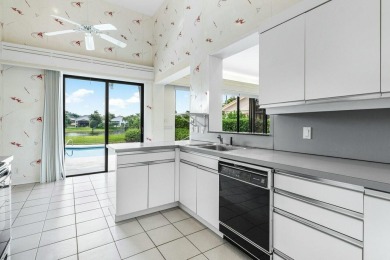 Exquisite lake and pool views offered at this 3 bedroom, 3.5 on Frenchmans Creek Country Club in Florida - for sale on GolfHomes.com, golf home, golf lot