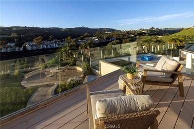 Enjoy panoramic views from this extensively remodeled home in on Monarch Beach Golf Links in California - for sale on GolfHomes.com, golf home, golf lot