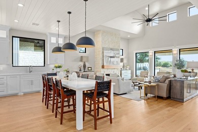 NEW CONSTRUCTION BY HILL COUNTRY SIGNATURE HOMES sits on garden on The Club At Comanche Trace in Texas - for sale on GolfHomes.com, golf home, golf lot