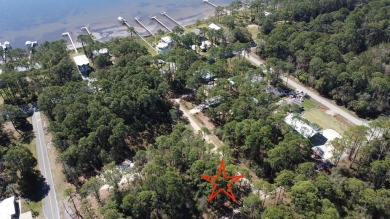 Prime Wooded Corner Lot Near the Bay! This beautifully wooded on St. James Bay in Florida - for sale on GolfHomes.com, golf home, golf lot