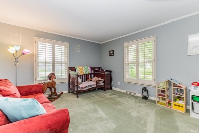 Welcome to this spacious 3-bedroom, 3-bath home nestled along on Muncie Elks Country Club in Indiana - for sale on GolfHomes.com, golf home, golf lot