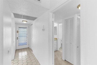 Welcome to this charming and spacious 2nd-floor condo located in on Wynmoor Golf Course in Florida - for sale on GolfHomes.com, golf home, golf lot