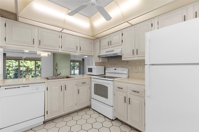 Welcome to this charming and spacious 2nd-floor condo located in on Wynmoor Golf Course in Florida - for sale on GolfHomes.com, golf home, golf lot