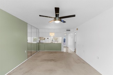 Welcome to this charming and spacious 2nd-floor condo located in on Wynmoor Golf Course in Florida - for sale on GolfHomes.com, golf home, golf lot