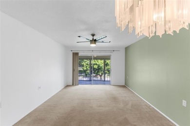 Welcome to this charming and spacious 2nd-floor condo located in on Wynmoor Golf Course in Florida - for sale on GolfHomes.com, golf home, golf lot