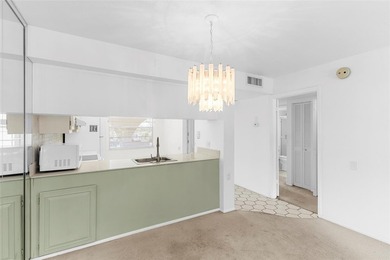 Welcome to this charming and spacious 2nd-floor condo located in on Wynmoor Golf Course in Florida - for sale on GolfHomes.com, golf home, golf lot