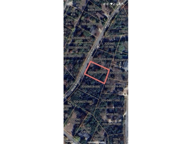 Ready to build your dream home? Quiet and gently wooded within a on Holiday Island Executive Golf Course in Arkansas - for sale on GolfHomes.com, golf home, golf lot