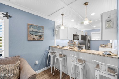 UPDATED. GOLF NEXT DOOR. MINUTES TO THE BEACH. This 2-bed on Holiday Golf Club in Florida - for sale on GolfHomes.com, golf home, golf lot