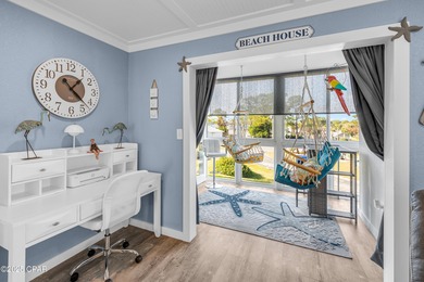 UPDATED. GOLF NEXT DOOR. MINUTES TO THE BEACH. This 2-bed on Holiday Golf Club in Florida - for sale on GolfHomes.com, golf home, golf lot