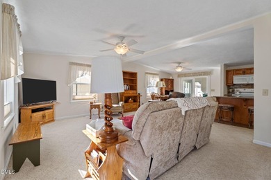 Welcome to lake living in this charming Ranch home located in a on River Golf and Country Club at Lake Royale in North Carolina - for sale on GolfHomes.com, golf home, golf lot