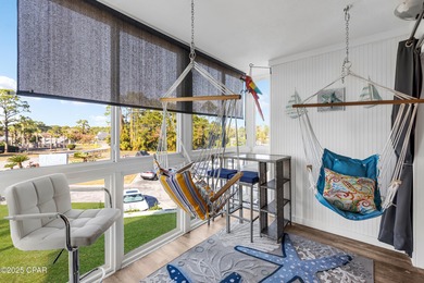 UPDATED. GOLF NEXT DOOR. MINUTES TO THE BEACH. This 2-bed on Holiday Golf Club in Florida - for sale on GolfHomes.com, golf home, golf lot