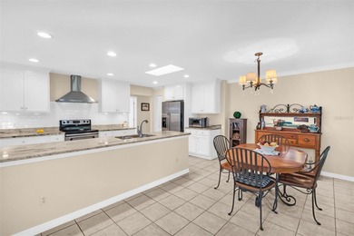 This beautifully updated and stunning home with nearly 1,900 on Highland Lakes Executive Golf Course in Florida - for sale on GolfHomes.com, golf home, golf lot