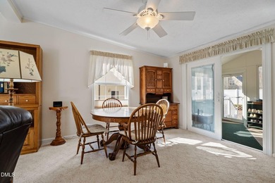 Welcome to lake living in this charming Ranch home located in a on River Golf and Country Club at Lake Royale in North Carolina - for sale on GolfHomes.com, golf home, golf lot