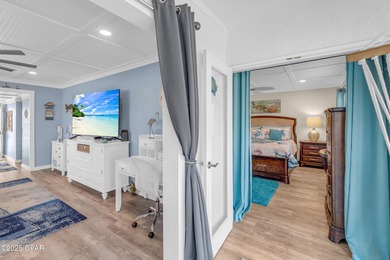 UPDATED. GOLF NEXT DOOR. MINUTES TO THE BEACH. This 2-bed on Holiday Golf Club in Florida - for sale on GolfHomes.com, golf home, golf lot