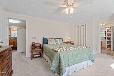 Welcome to lake living in this charming Ranch home located in a on River Golf and Country Club at Lake Royale in North Carolina - for sale on GolfHomes.com, golf home, golf lot