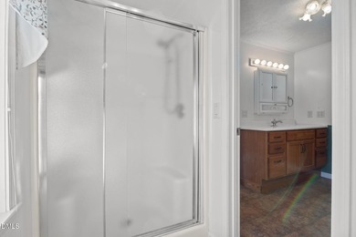 Welcome to lake living in this charming Ranch home located in a on River Golf and Country Club at Lake Royale in North Carolina - for sale on GolfHomes.com, golf home, golf lot