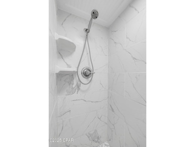 UPDATED. GOLF NEXT DOOR. MINUTES TO THE BEACH. This 2-bed on Holiday Golf Club in Florida - for sale on GolfHomes.com, golf home, golf lot