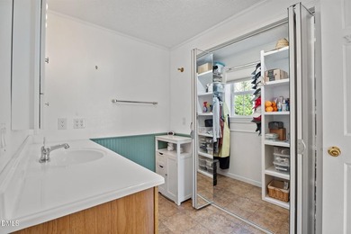 Welcome to lake living in this charming Ranch home located in a on River Golf and Country Club at Lake Royale in North Carolina - for sale on GolfHomes.com, golf home, golf lot