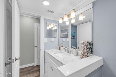 UPDATED. GOLF NEXT DOOR. MINUTES TO THE BEACH. This 2-bed on Holiday Golf Club in Florida - for sale on GolfHomes.com, golf home, golf lot