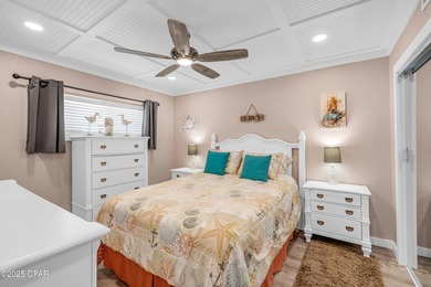 UPDATED. GOLF NEXT DOOR. MINUTES TO THE BEACH. This 2-bed on Holiday Golf Club in Florida - for sale on GolfHomes.com, golf home, golf lot